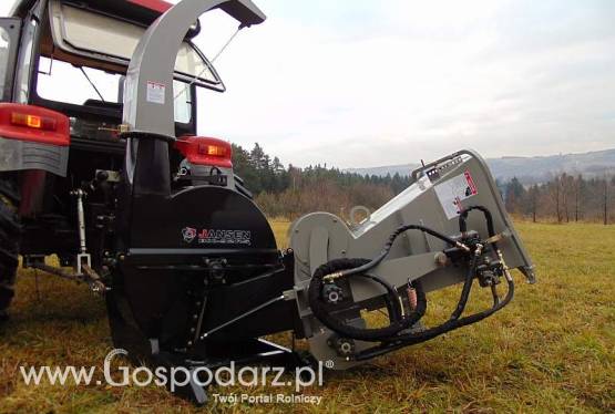 Rębak tarczowy o wzmocnionej konstrukcji JANSEN 92RS. Cztery noże tnące + dwa wałki pobierające materiał napędzane hydraulicznie.